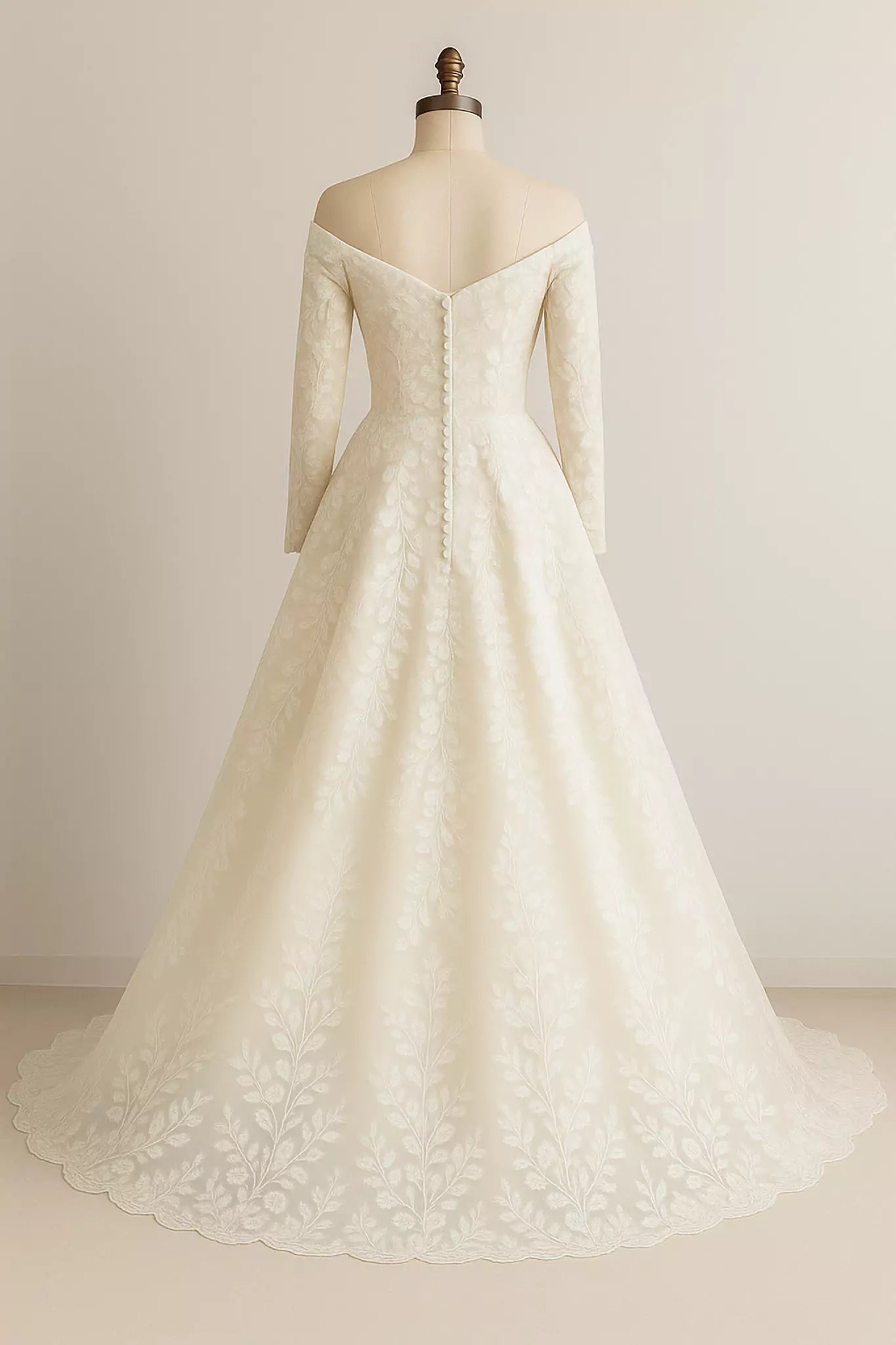 Back view of Bellagio Bloom gown showing low scoop back, covered buttons, and chapel-length train handcrafted in Lake Como.