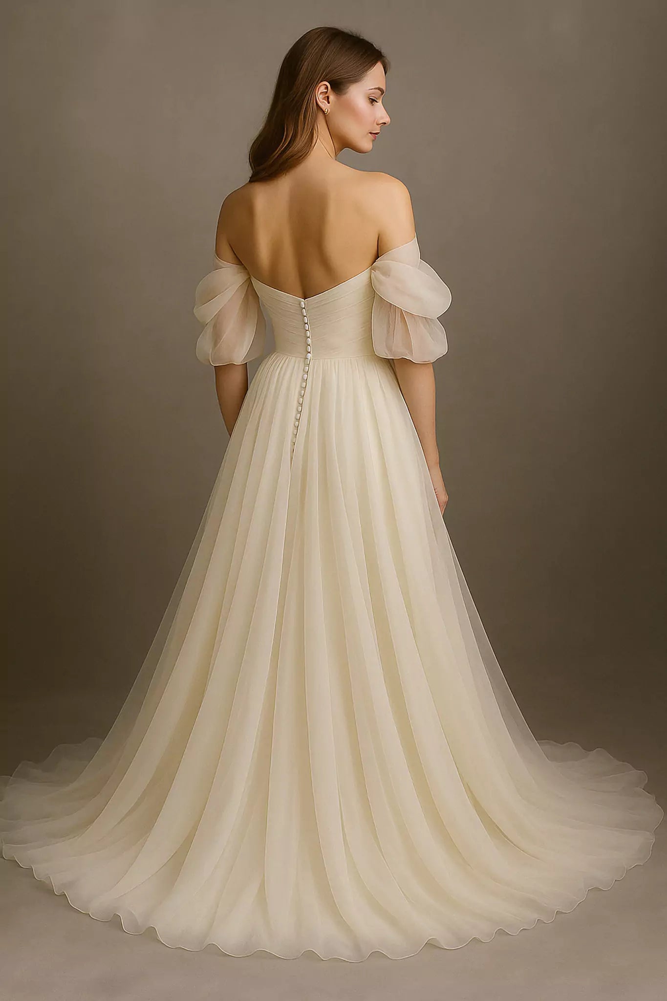 Back view of off-shoulder silk chiffon wedding dress with soft train and elegant open back design