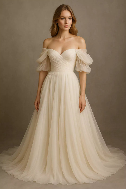 Front view of luxury off-shoulder bridal gown in silk chiffon with romantic draping and flowing silhouette