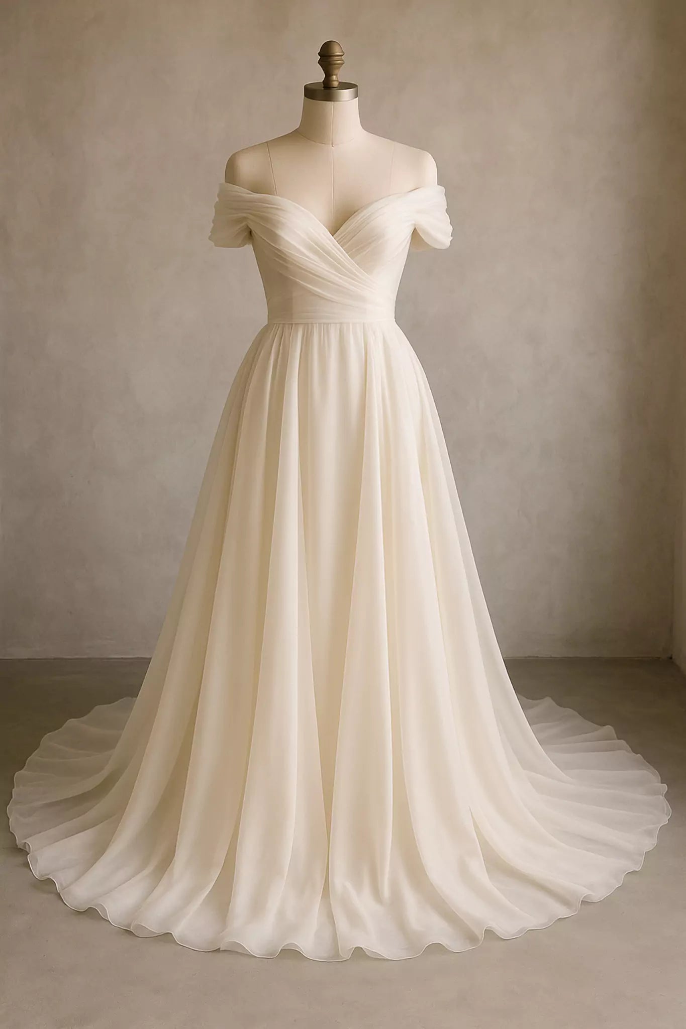 Luxury off-shoulder bridal gown in silk chiffon displayed on mannequin to show structure and drape